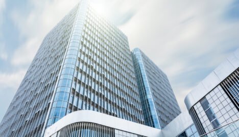 giant building with sun scaled e1729813296512